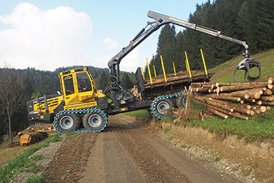 Articulated forwarders carry felled timbers from the woods to a roadside landing for subsequent loading onto log trucks. They are built to operate on uneven ground and severe slopes. | Image courtesy Hohenloher Spezial-Maschinenbau GmbH