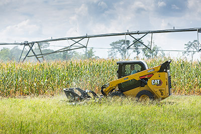 The loaders have a high-flow, high-pressure hydraulic system for powering demanding vegetation-management applications such as right-of-way clearing, brush cutting and mowing.