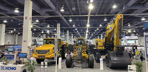 XCMG displayed three new customized products at MINExpo 2021, an articulated dump truck, grader and the XE950G excavator.