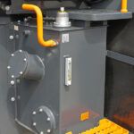 Tank-for-Hydraulic-Oil-With-Sight-Glass-Level-at-Construction-Machine-AdobeStock_1648940484